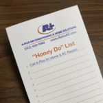 Notepad with "Honey Do List" for home tasks, branded by A-Plus Air Conditioning & Home Solutions.