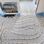 Flexible piping network on a grid floor, showcasing A-Plus Air Conditioning's in-floor radiant heating system installation.